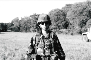 Picture of an employee in her Army uniform