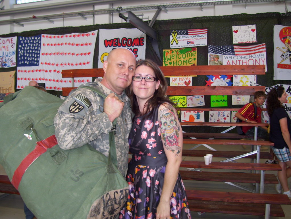Employee with her husband who is a Soldier