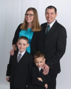 Military Spouse Employee with her husband and sons