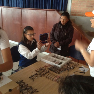 Child receiving eye exam in Bogota, Colombia