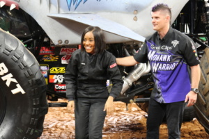 Carrie with a Monster Jam driver