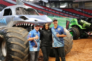 Carrie with Monster Jam drivers