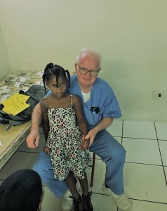 Dr Chambers with a little girl