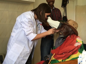 Dr. Studer in Kenya giving an eye exam